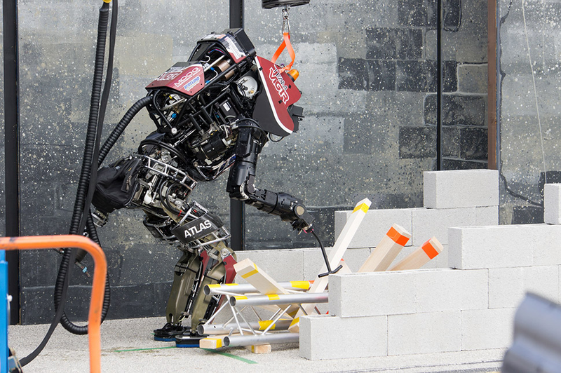 Illustration for article titled On Site at the Machine Olympics of DARPA's Robotics Challenge
